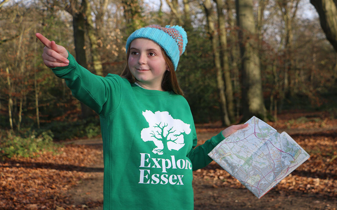 Tourism PR, girl pointing with map