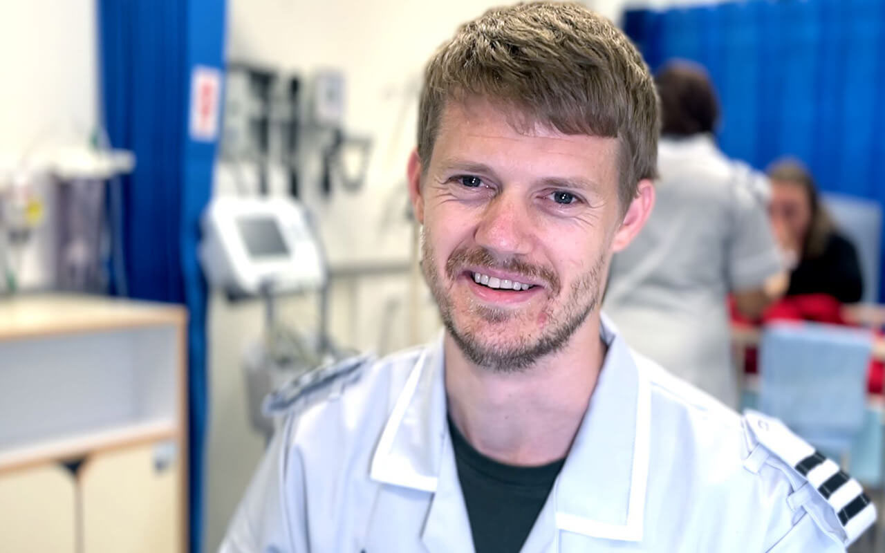 A male nurse smiling, pr agency brentwood; pr agency braintree; pr agency basildon; pr agency colchester; pr agency chelmsford; pr agency cambridge; pr agency epping; pr agency essex; pr agency harlow; pr agency herts; pr agency ipswich; pr agency suffolk; pr southend; pr thurrock; pr norfolk; commercial photographer colchester; commercial photographer essex; charity pr; event pr; tourism pr